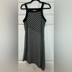 2/$20 Charlie Paige Asymmetrical Black and White stripped Dress nice side slit